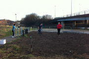 Josh's family and friends clearing the site