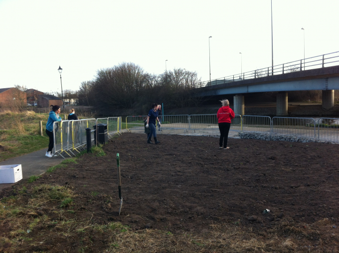 Josh's family and friends clearing the site