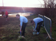 Josh's family and friends clearing the site