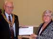 Outgoing Town Mayor, Cllr. John. Kitwood, hands over £750.00 from the proceeds of his Mayor's Appeal  to the Carers Support Centre