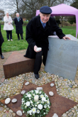 Deputy Mayor Cllr Brian Parker Laying a stone at the Memorial