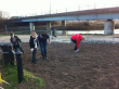 Josh's family and friends clearing the site