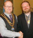 Town Mayor, Cllr. Edward Arnott, congratulates Cllr. James Truepenny who was elected to serve as Deputy Town Mayor/Town Mayor Elect, 2014-15