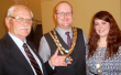 Outgoing Town Mayor, Cllr. John Kitwood congratulates the newly elected Town Mayor 
and Mayoress.